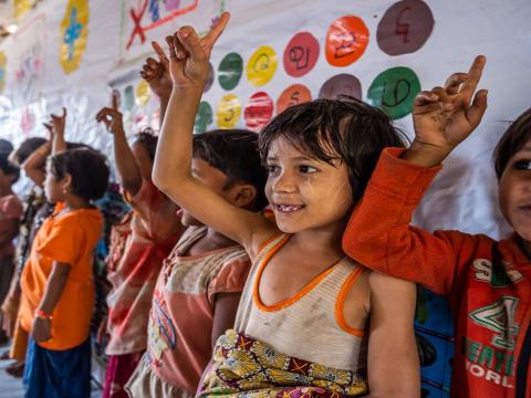 Children raising Hands